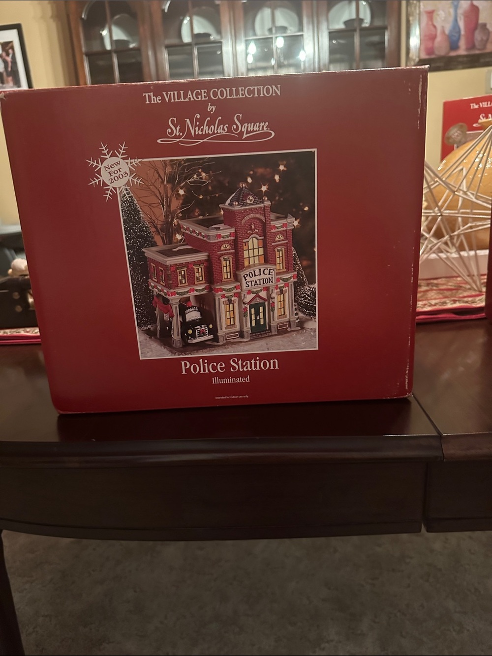 St. Nicholas Square Red and White Illuminated Police Station Holiday Decor